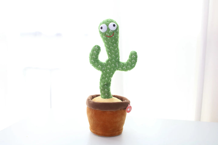 white background, white ground, brown plush flowerpot, big eyes with red embroidery smile, red play button, green voice-activated talkback singing  and dancing cactus toy, bluetooth toddler and baby toy, repeats what you say, dancing cactus